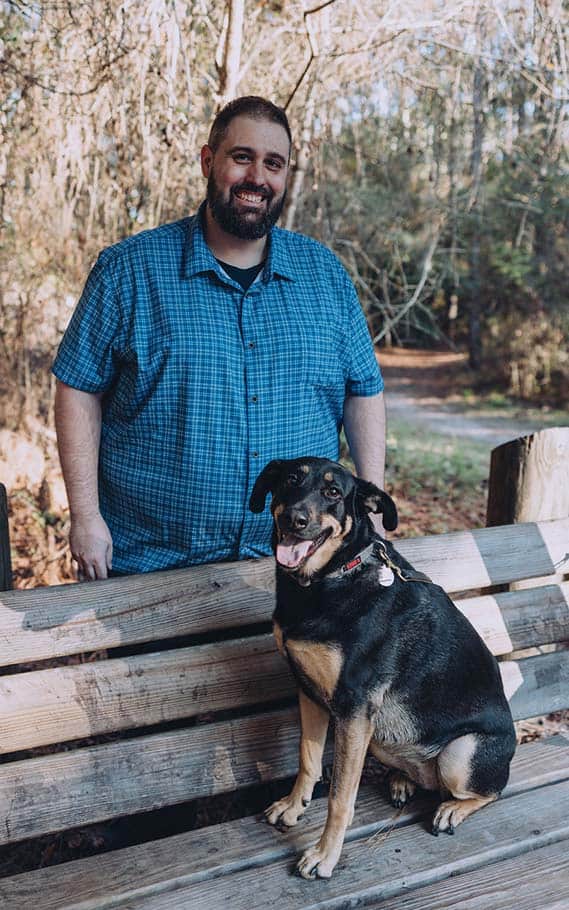 Ken Wille, expert dog trainer in Tampa, FL, with his two dogs.